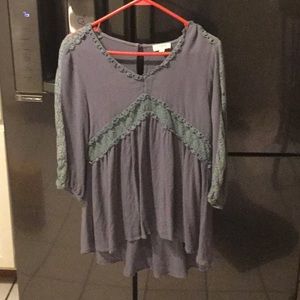 This is a Blouse/Top. It’s unique